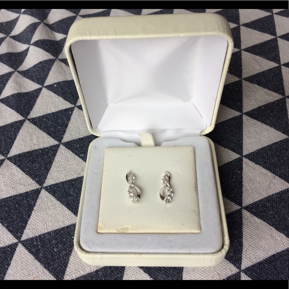Diamond and white sapphire earrings